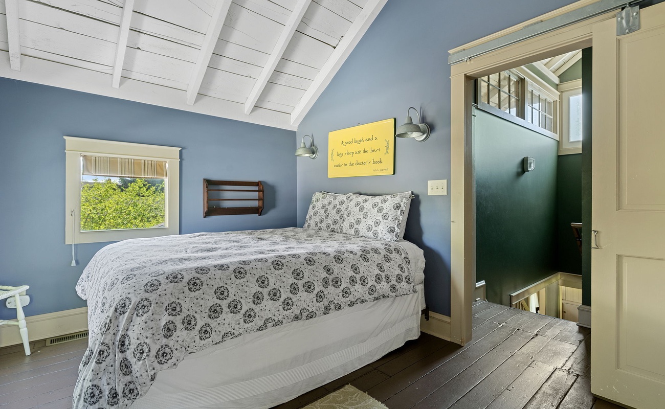 Bedroom 2 is on the upper level & has a queen-size bed.