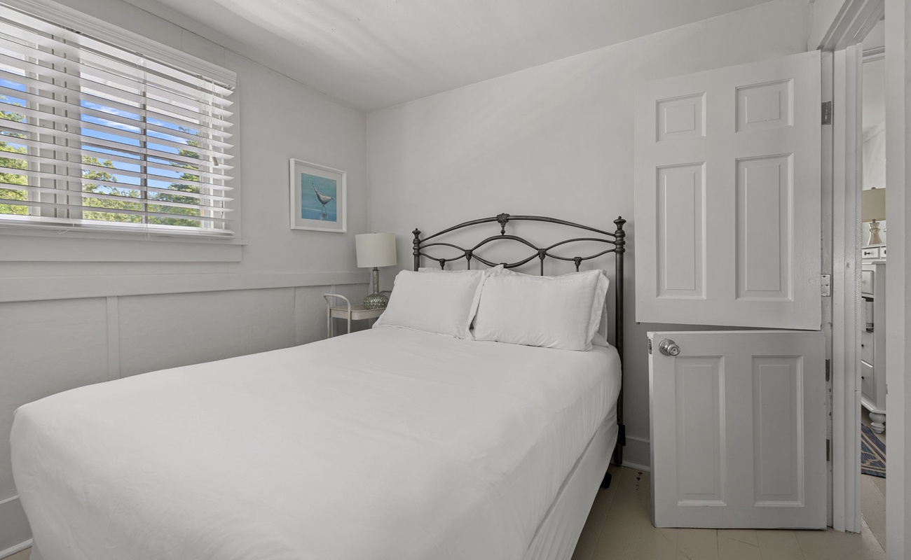 Bedroom 2 is on the upper level & has a double-size bed.