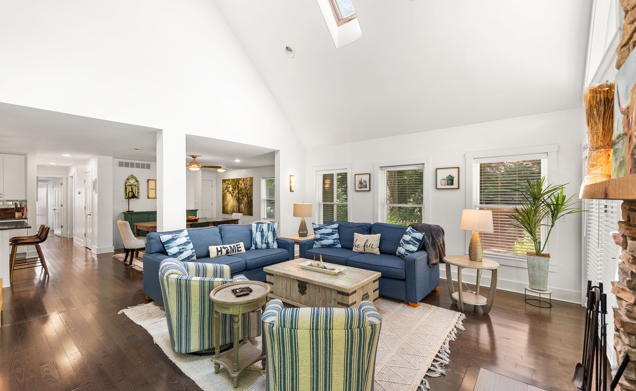 Open-concept living with warm textures and coastal flair.