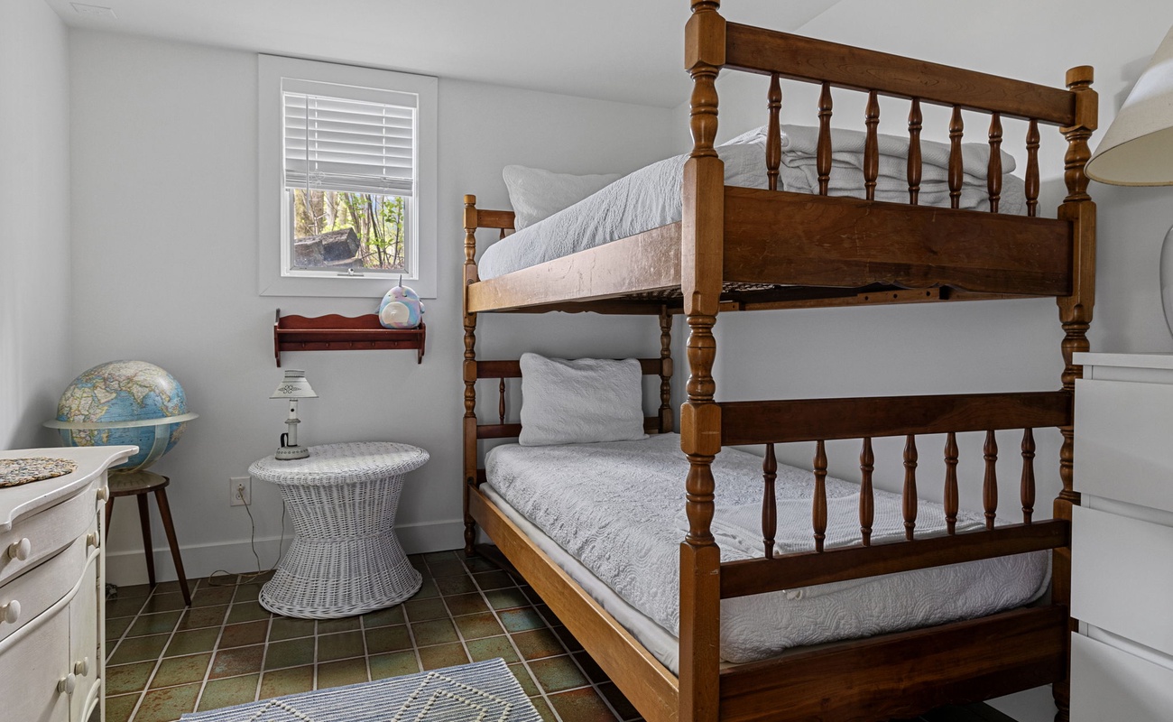 Bedroom 4 is on the main level & has a twin-size bunkbed.