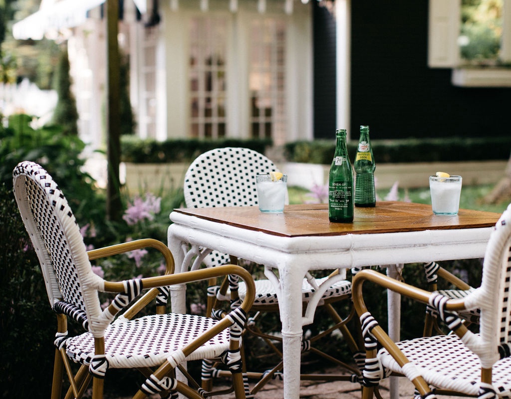 Dining options extend outdoors with a large furnished patio.