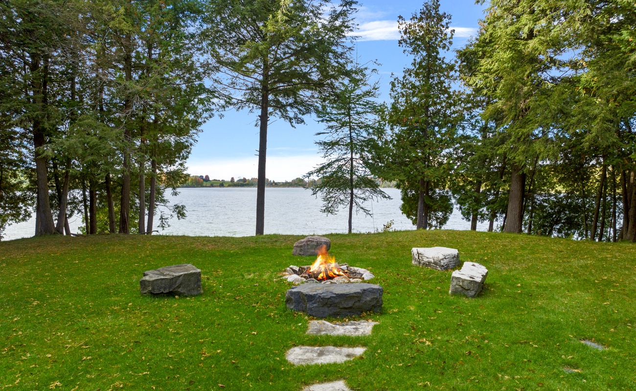 Gathering around a firepit by the lake with your family or friends. Priceless.