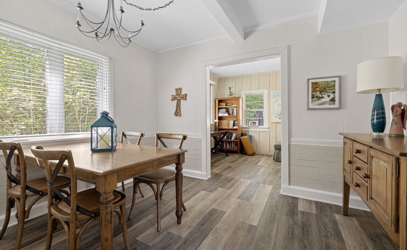 This dining space blends charm and comfort, creating the perfect backdrop for meals that linger long after the last bite.