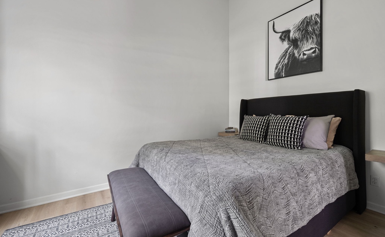 Bedroom 2 has a queen-size bed.