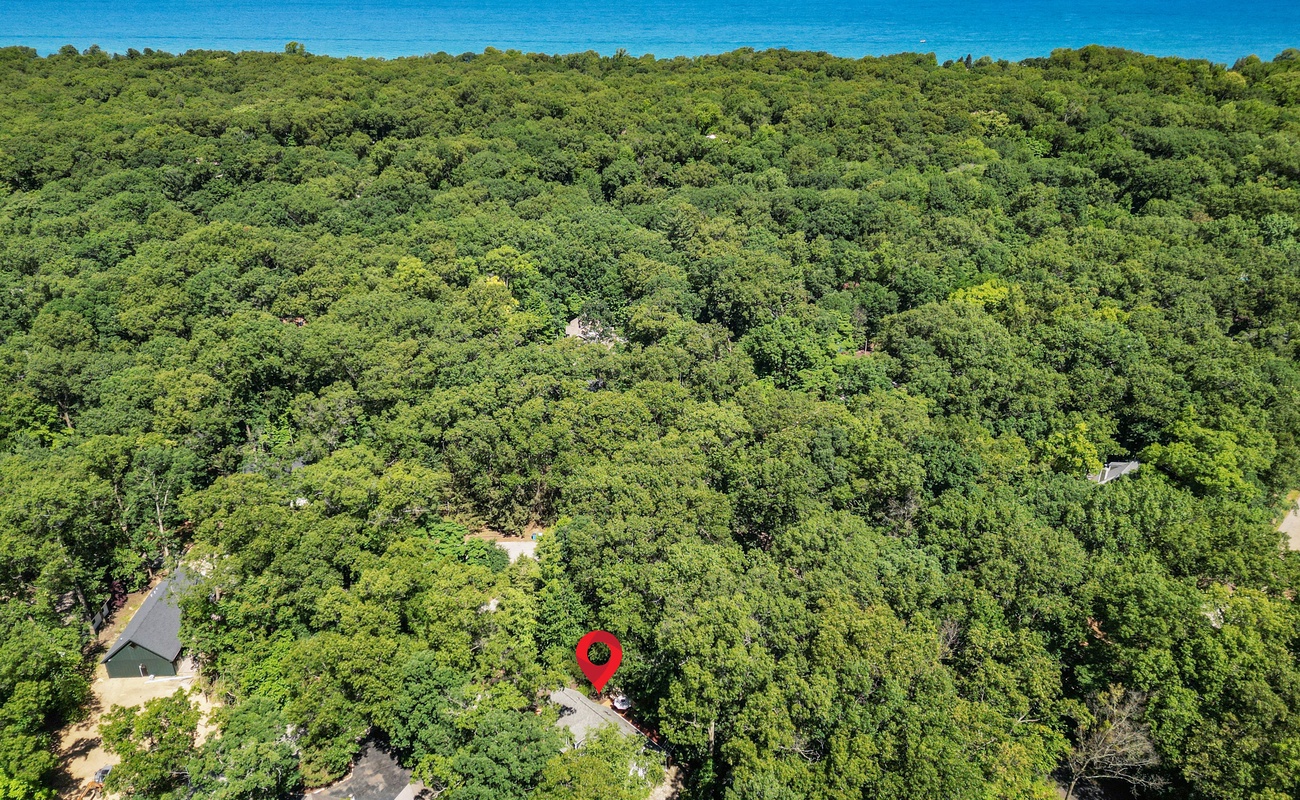 Lakeside living, hidden in the treetops.