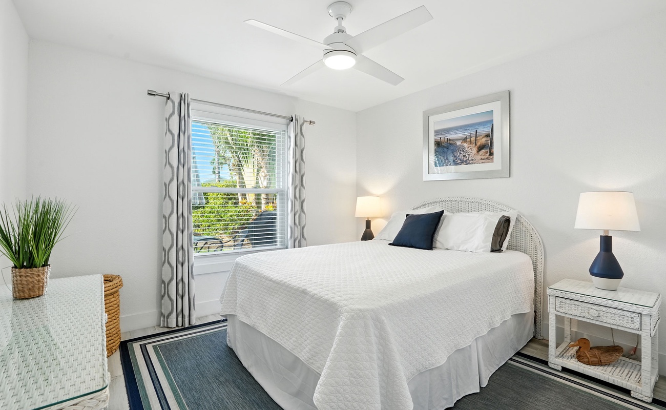 Bedroom 2 has a queen-size bed.