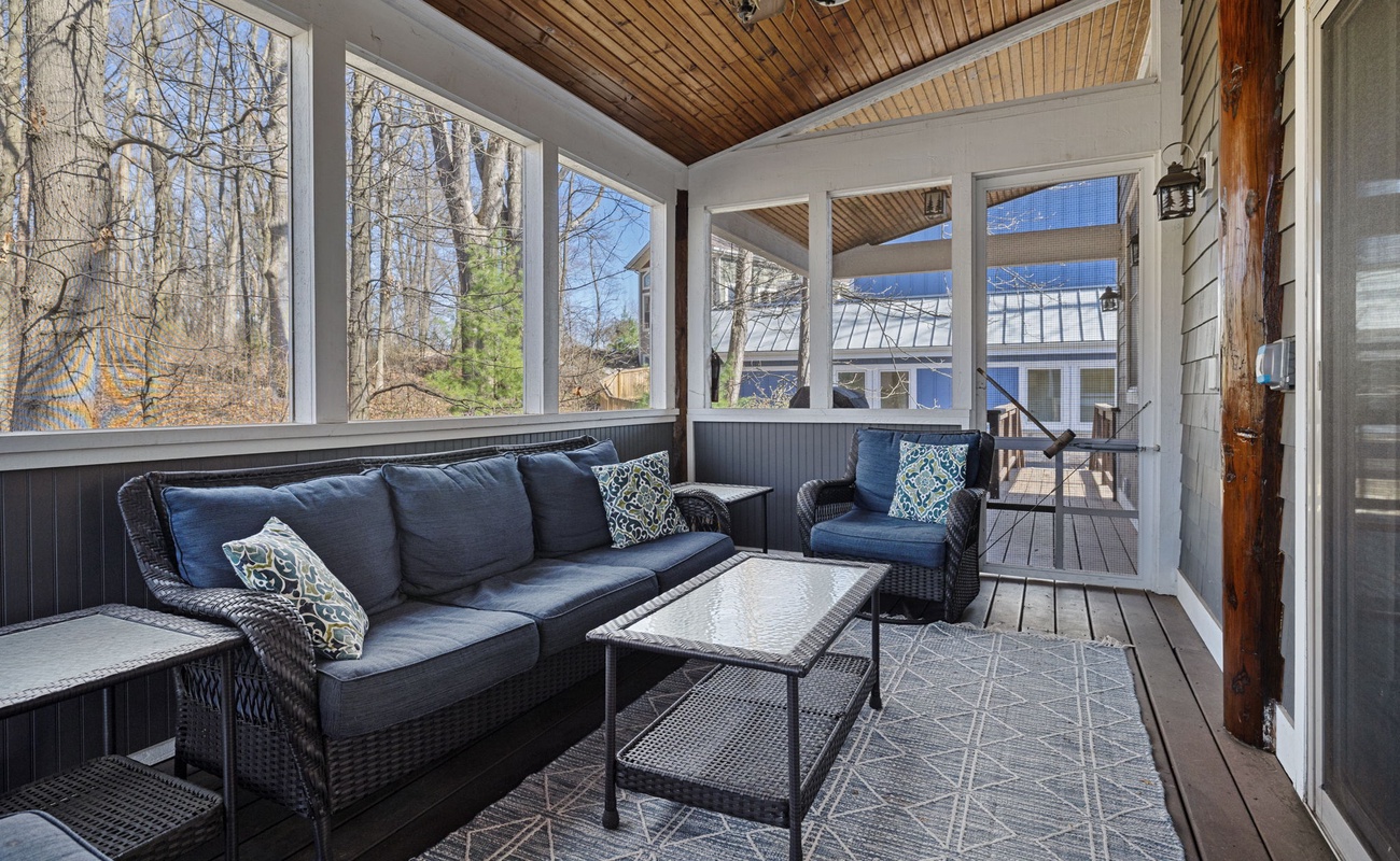An amazing, enclosed patio off the main living space is ideal for four-season dining and entertainment.