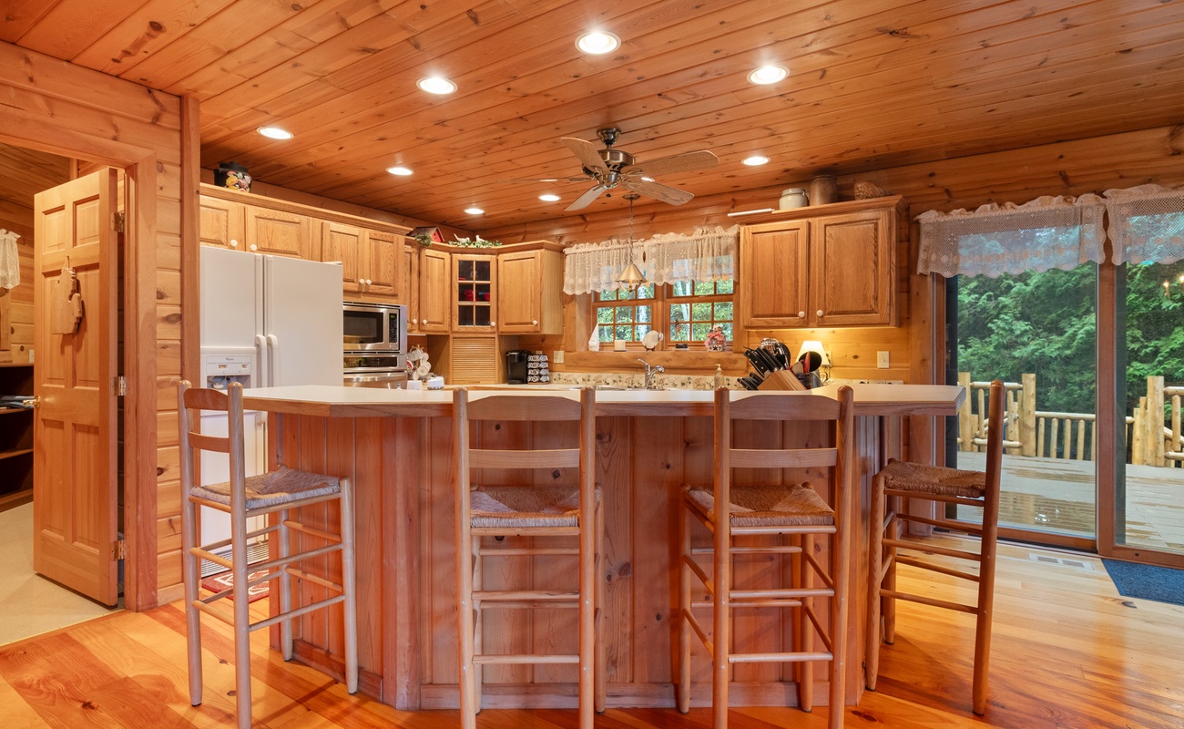 Each morning, this custom kitchen island becomes coffee lovers' Central Station.