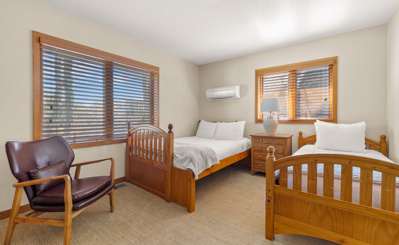 Bedroom 3 is on the upper level & has a full and twin-sized beds.