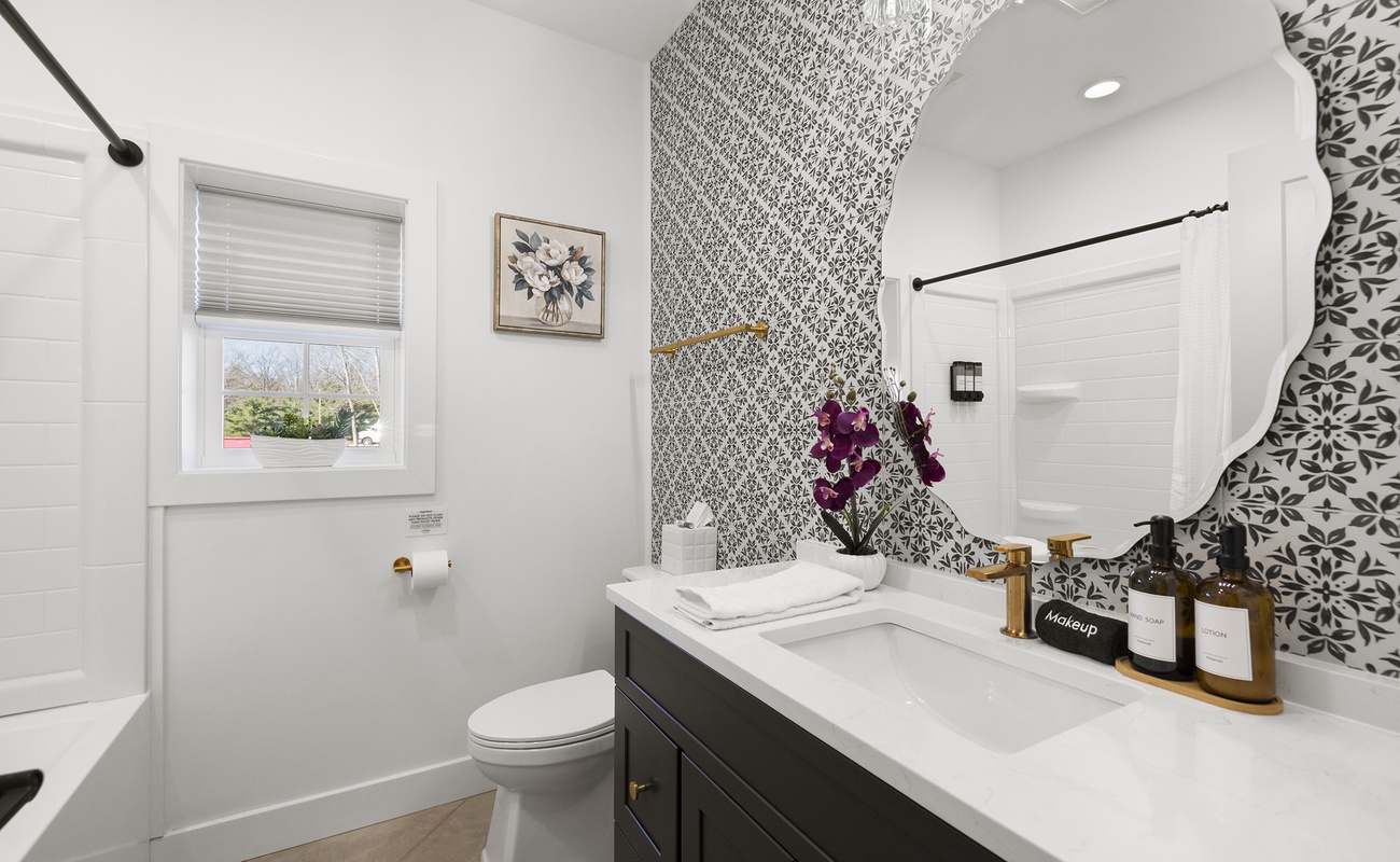 Stylish bath space offering comfort as you prepare for your day.
