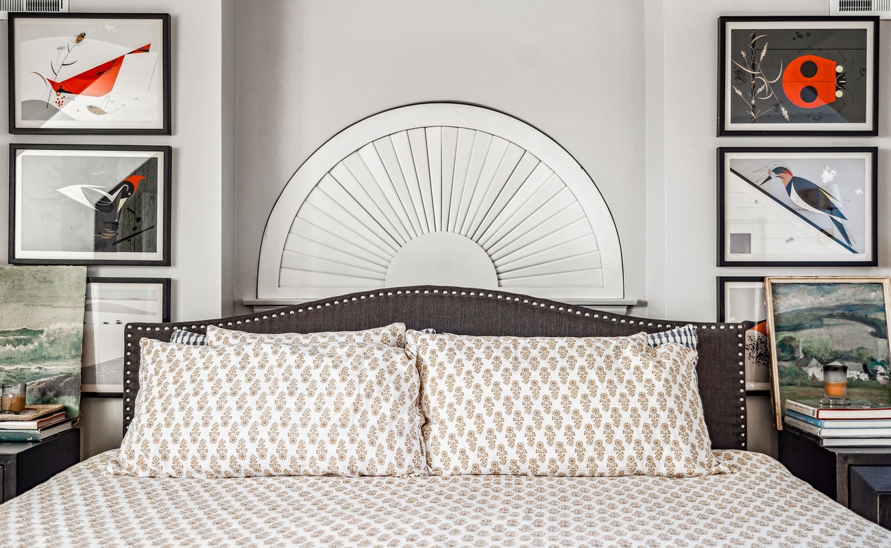 Primary bedroom is on the upper level & has a queen-size bed.