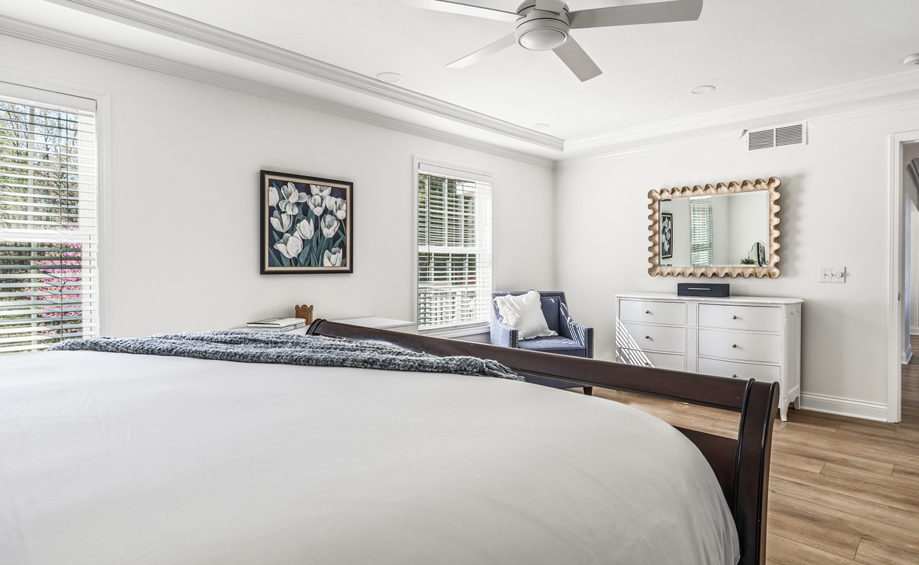 Cozy reading nook, plush bedding, and natural light galore—yes, please!