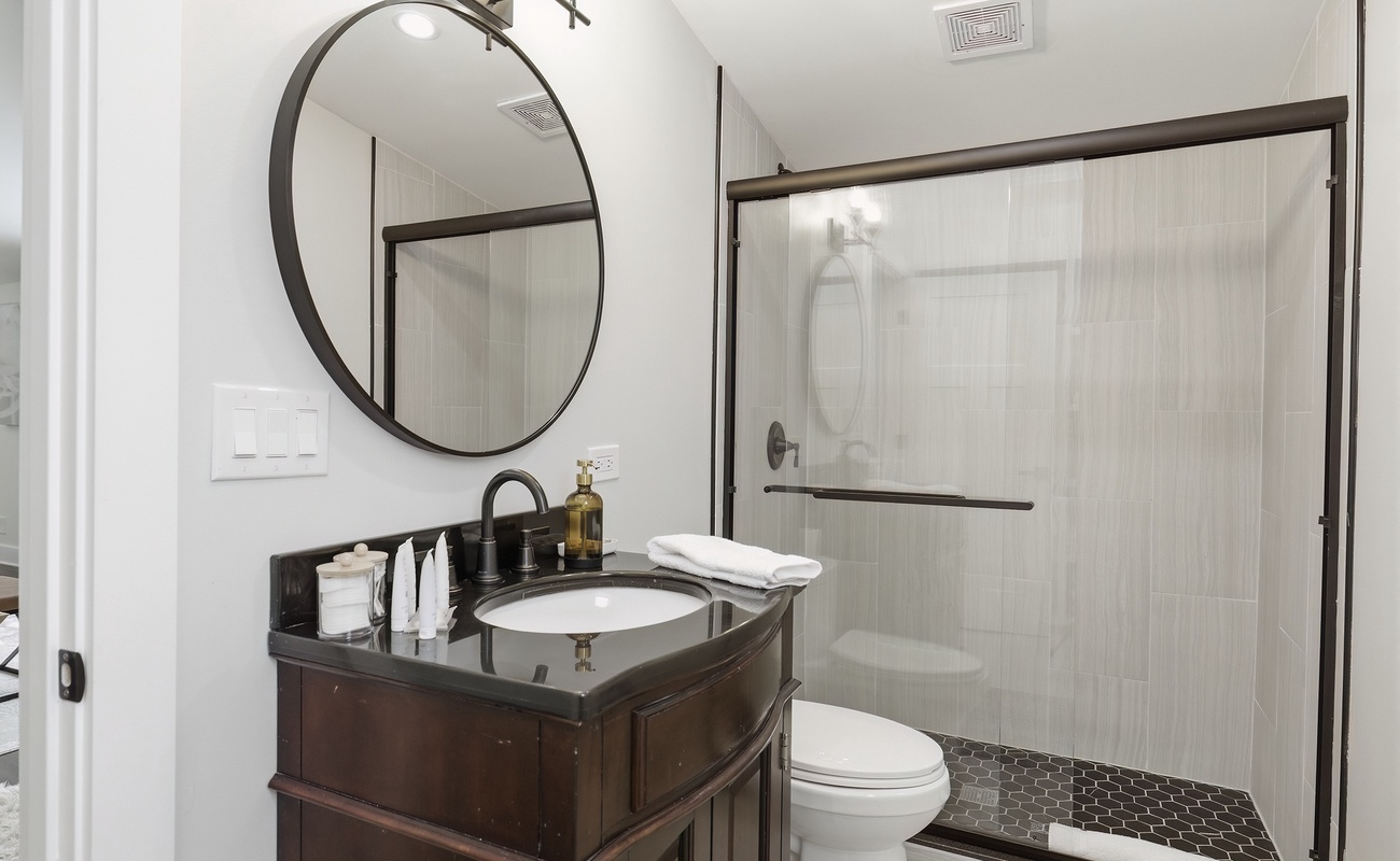 Clean lines and modern decor create a crisp, inviting space to get ready.