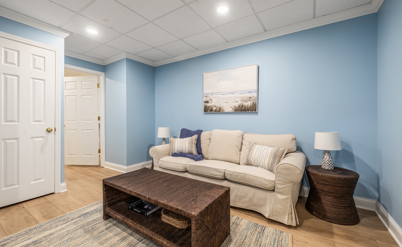 This comfy corner is where sandy toes rest, giggles echo, and family memories take shape.