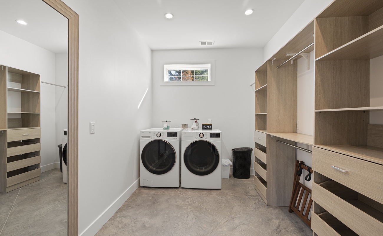 Tackle laundry with ease in this spacious upper level washroom.