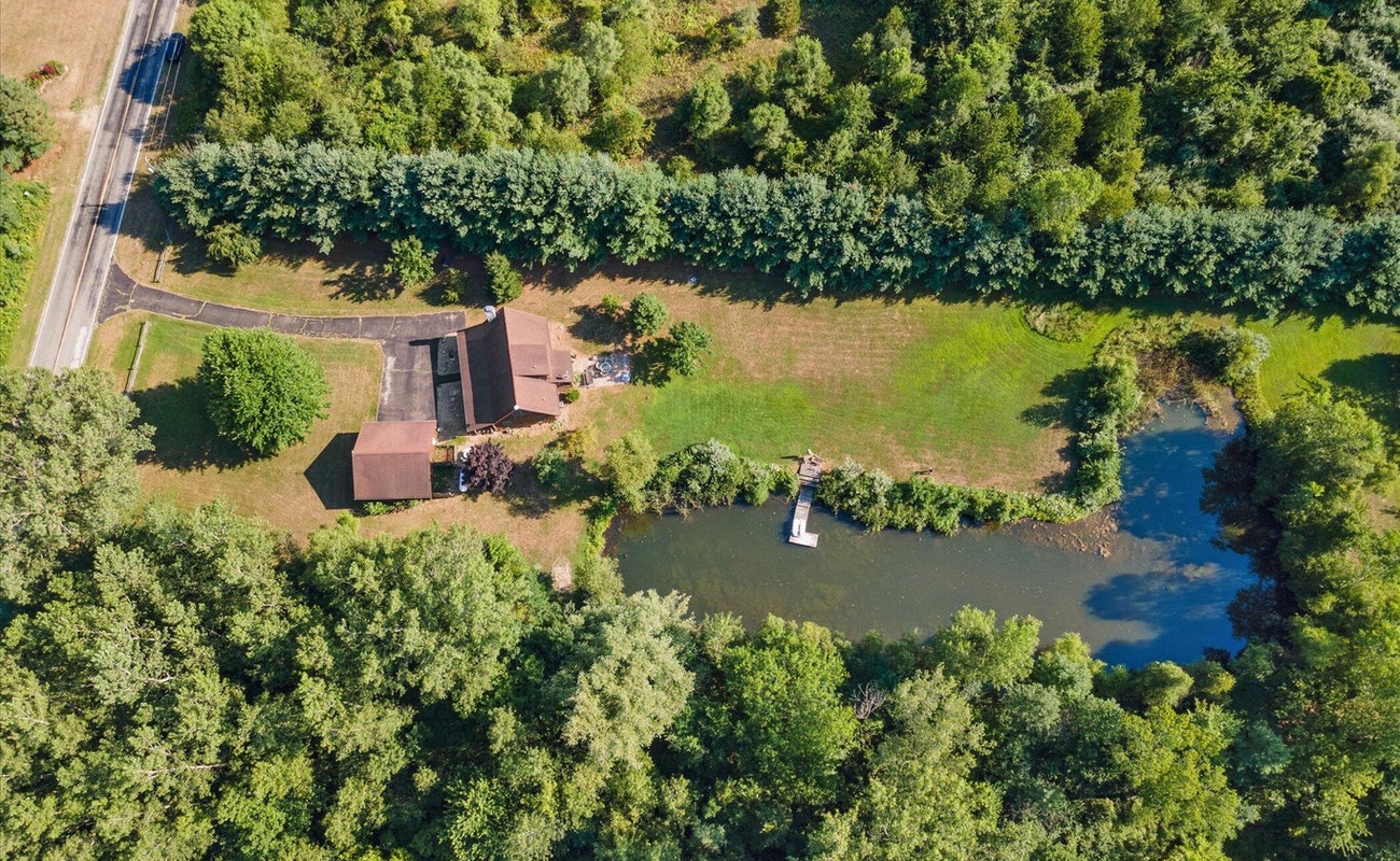 10 secluded acres with a pond all your own.