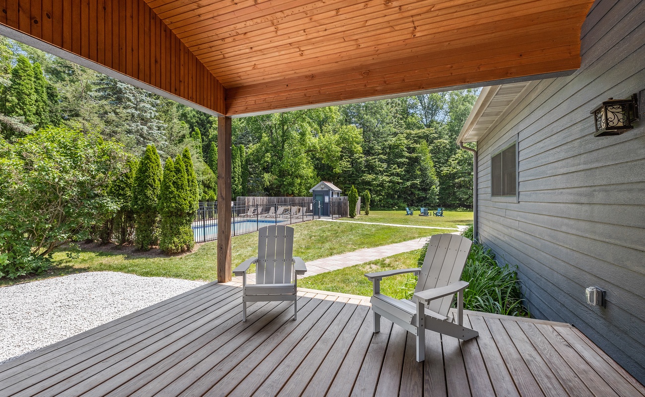 The covered porch is a wonderful place to escape with your morning cup of coffee.
