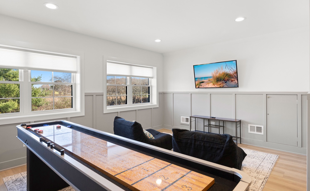 Enjoy sunny views while playing shuffleboard and watching a movie.