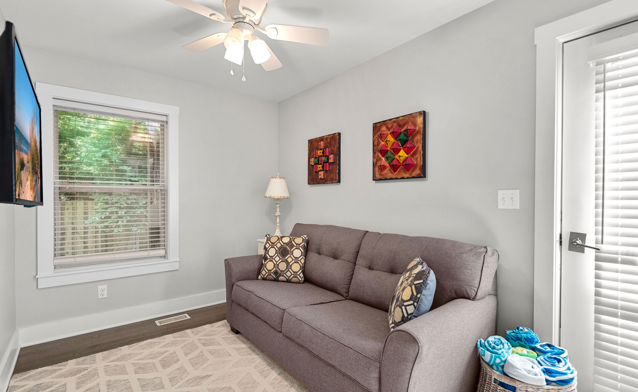 A cozy corner made for lazy afternoons and late-night flicks.