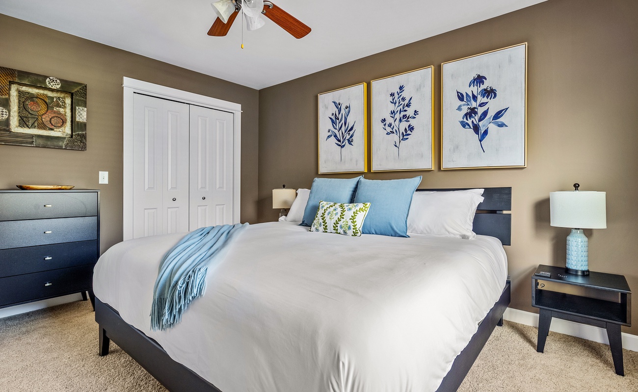 Crisp linens, calming art, and a room made for deep rest.