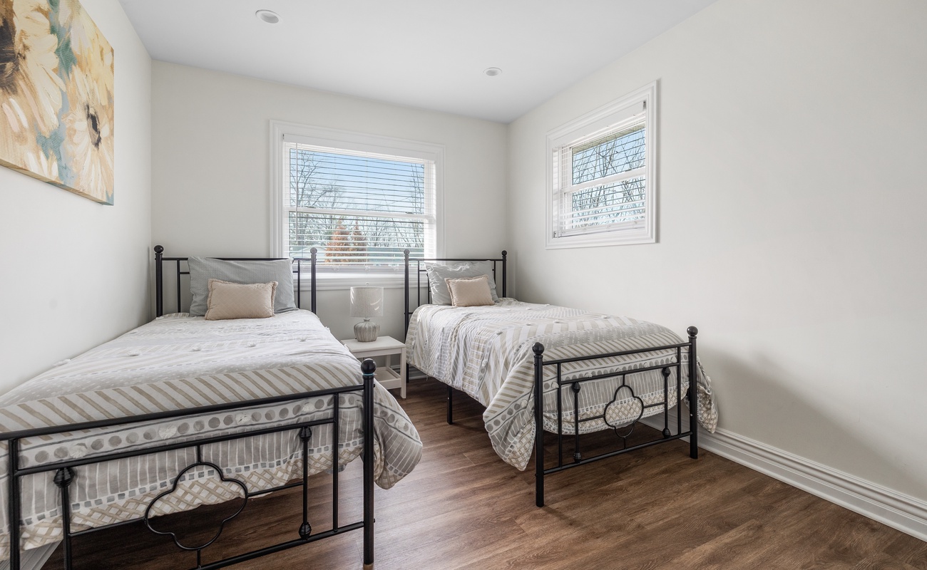 Bedroom 3 is on the main level & has 2 twin beds.