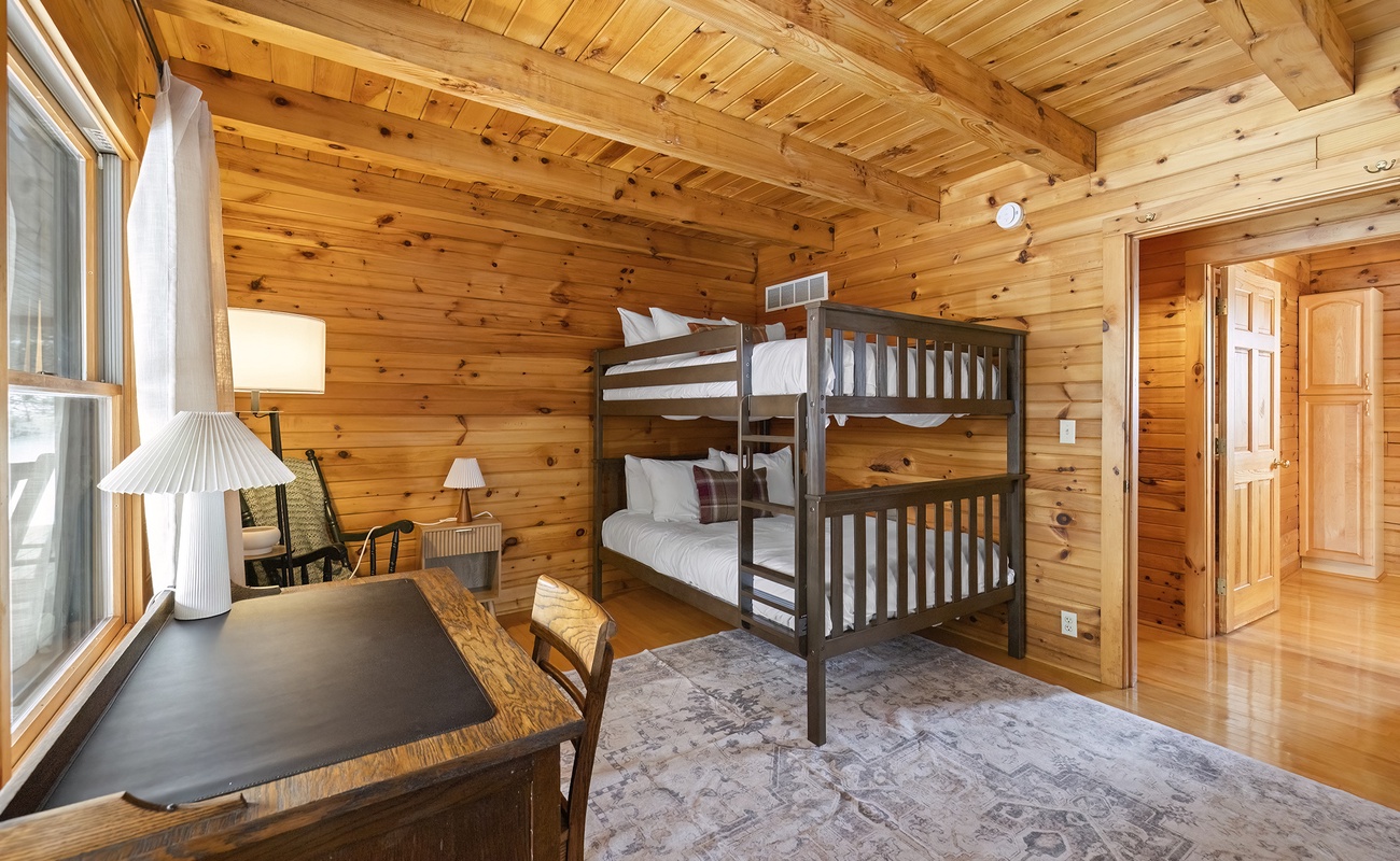 Our warm wood bunk room is perfect for shared nights.