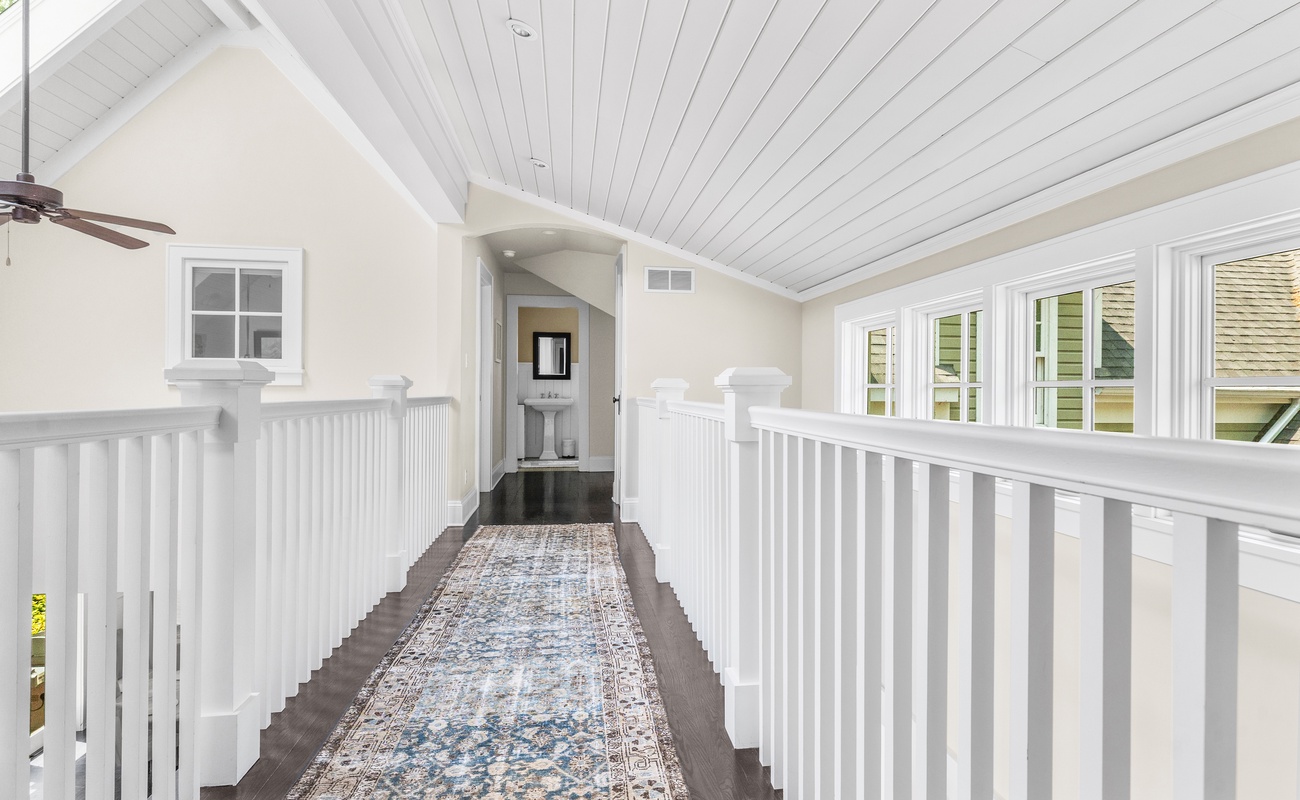 From suite to suite, stroll in style under pitched ceilings.