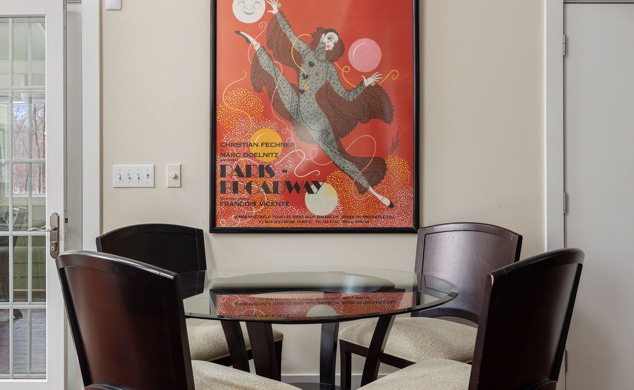 Just off the kitchen in the Great Room is a cute 4-seater breakfast nook table.