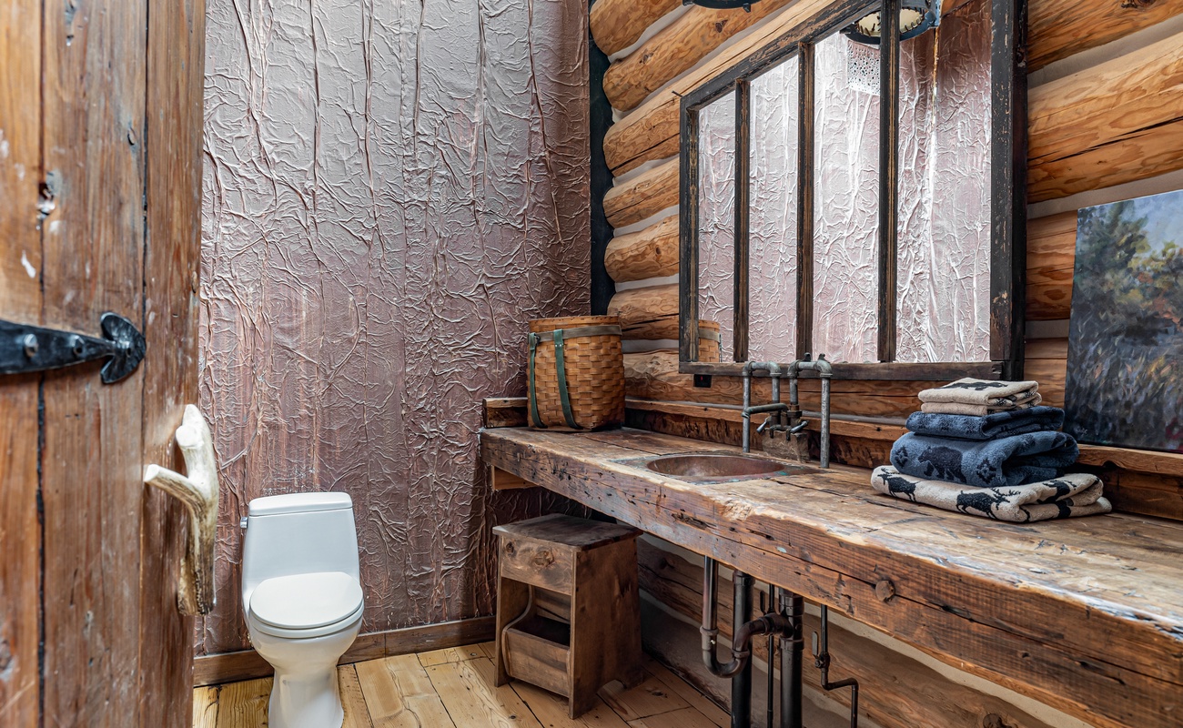 This stunning wooden wall transforms your daily rituals into a soothing escape.