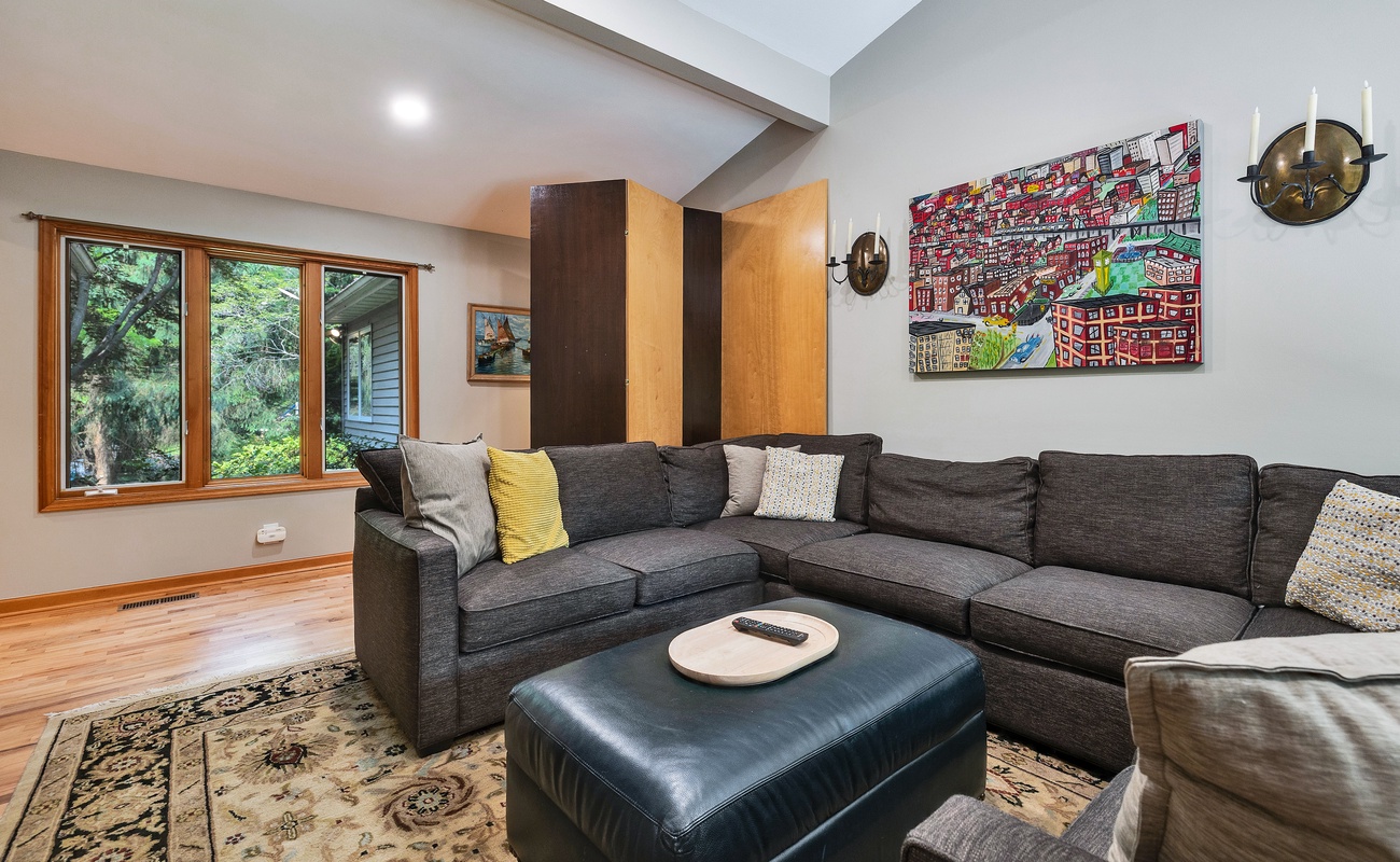 Lounge in style with art, light, and plush textures.