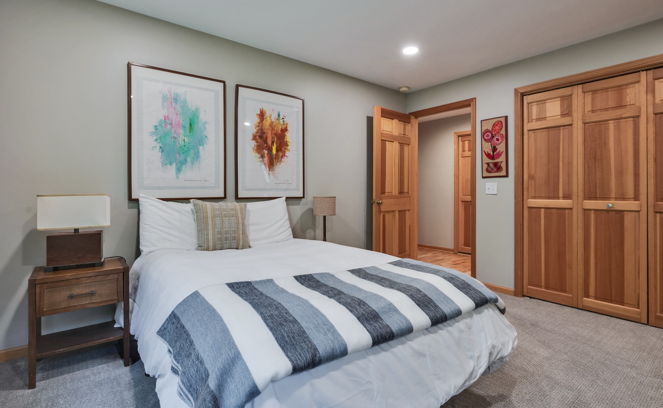 Bedroom 5 is on the main level & has queen-size bed.