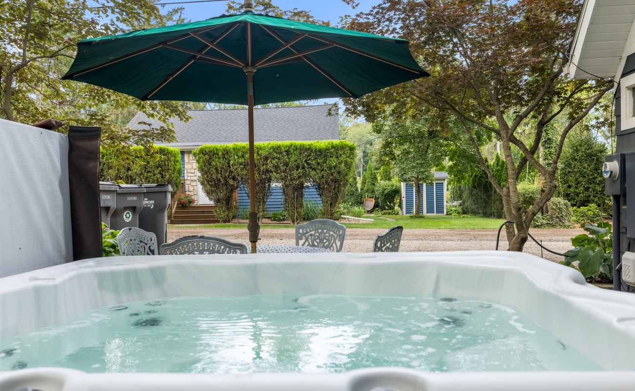 Soak beneath the shade—your private spa awaits.