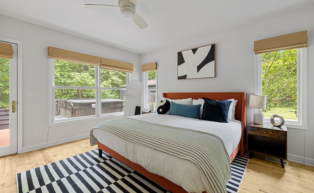 Primary bedroom is on the main level & has a king-size bed.