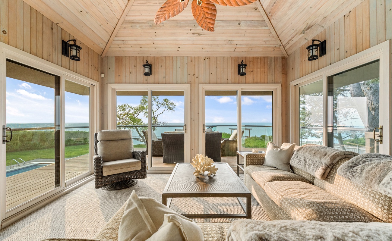 Our guests say this 3 Season sunroom is a popular spot for chillin' with a view.