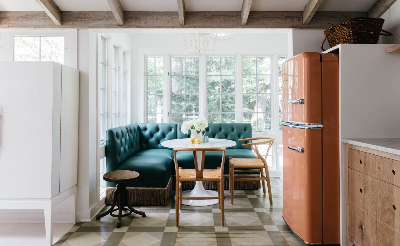 Patterned floors and a charming palette provide the utmost in cottage comfort.