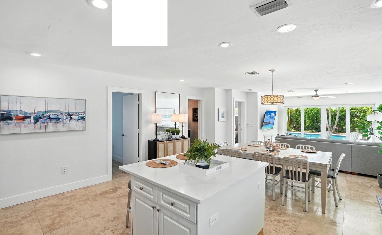 Seamless flow from kitchen to cocktails by the pool.