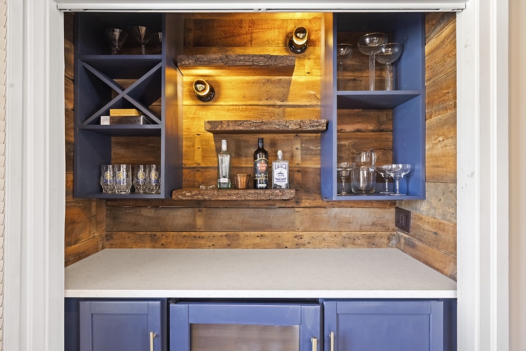 Pour, mix, and enjoy in this intimate bar nook at The Farmhouse.
