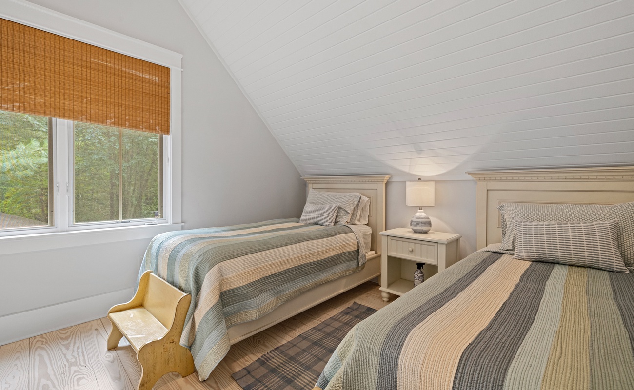 Two twin beds side by side to share bedtime stories.