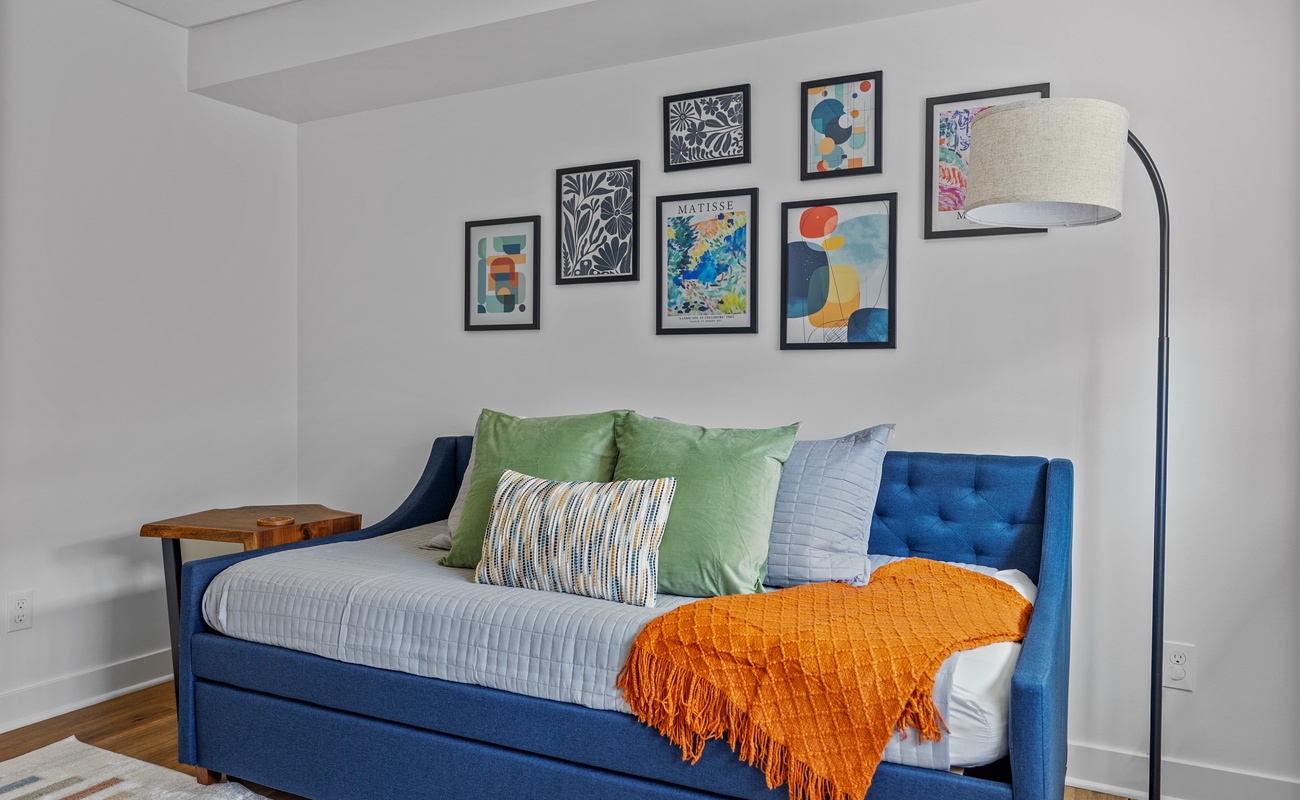 Nap spot by day, cozy crash pad by night—this bed does both!