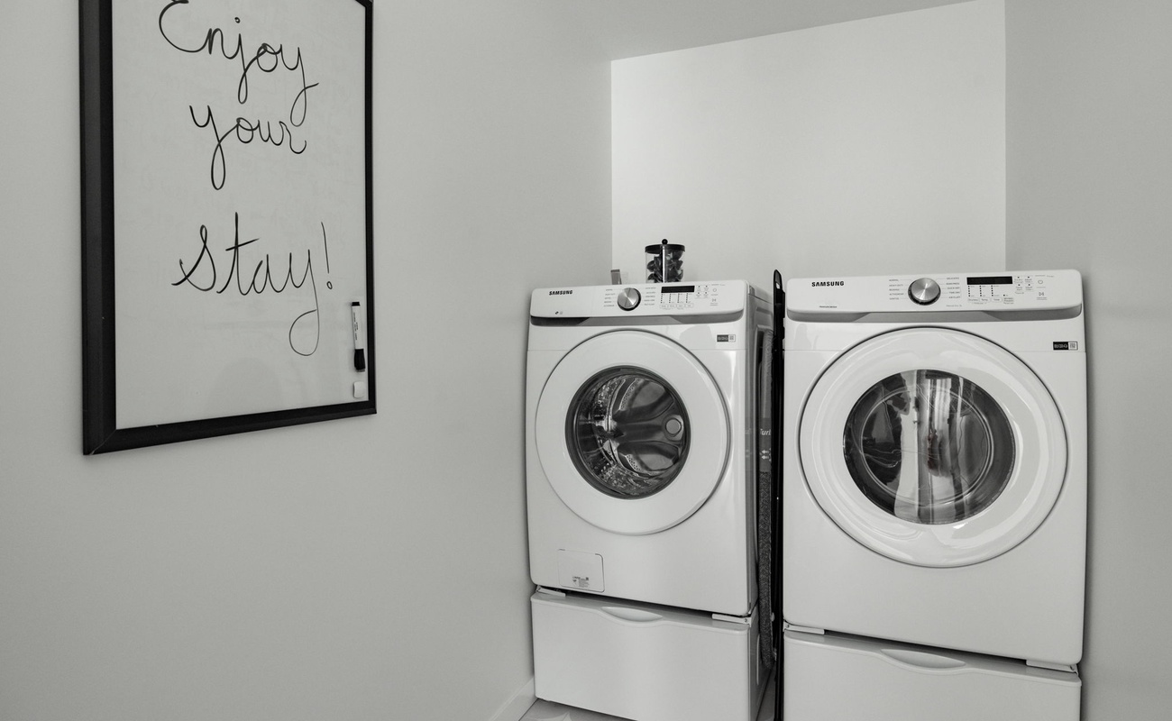 Where clothes go to glow up—this laundry space is serving spotless and stylish.