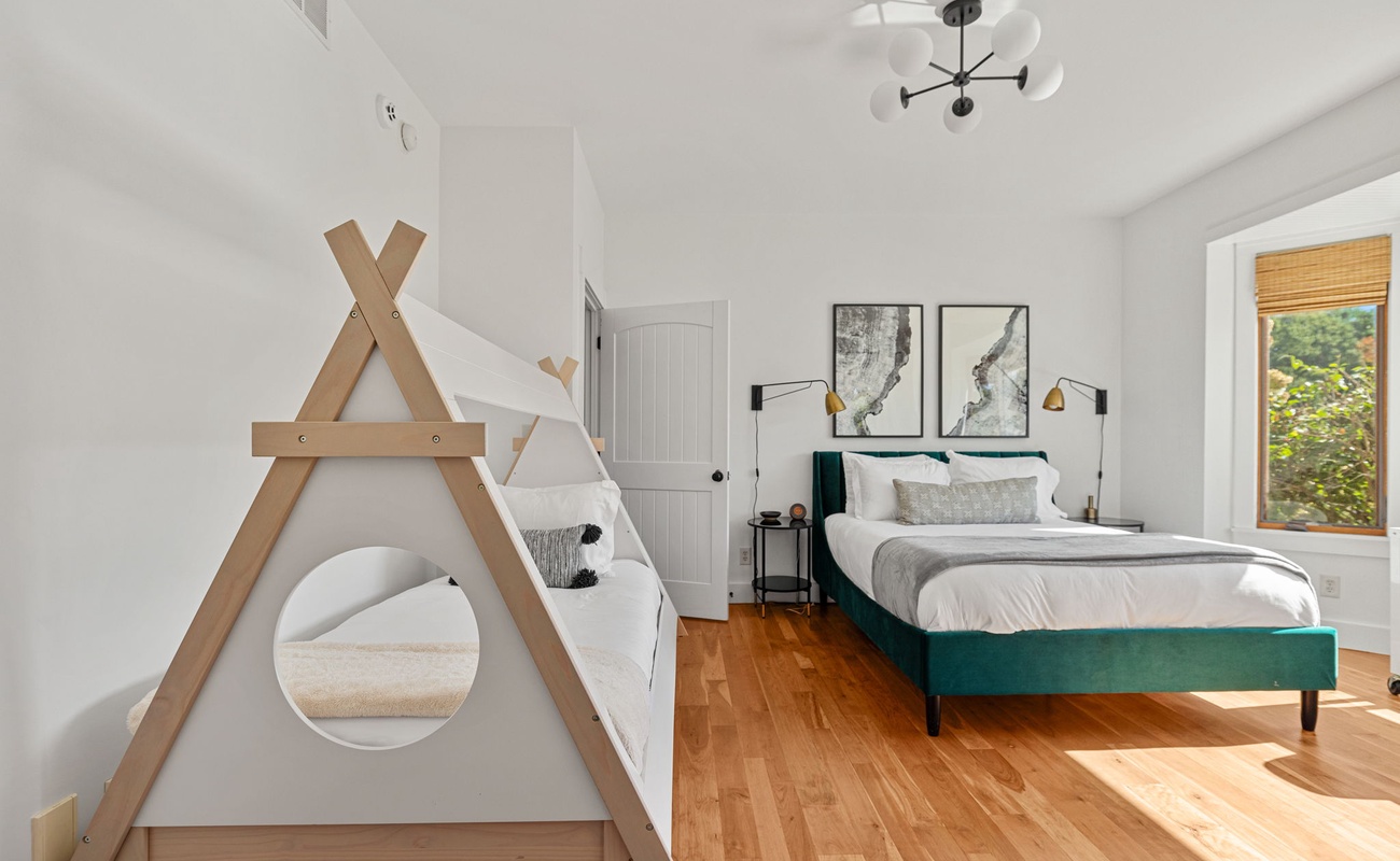 Bedroom 2 is on the main level & has queen-size bed and 2 twin-size beds.