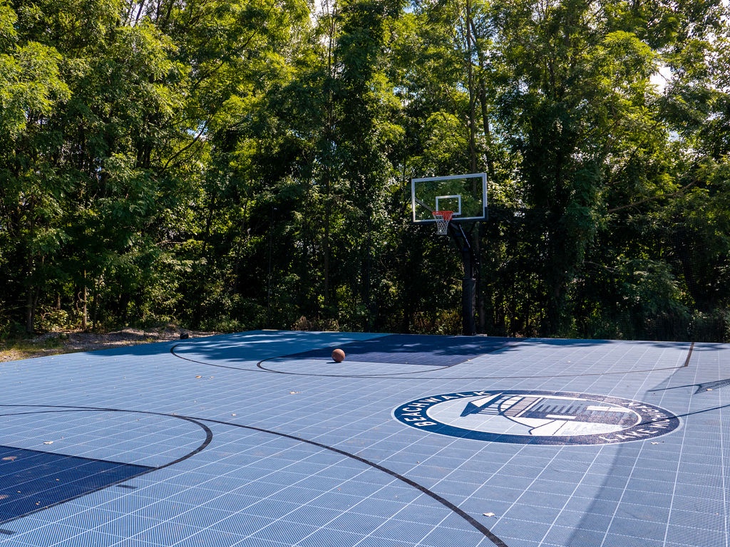 Shoot hoops and burn off energy between beach days at the Resort's sports court.