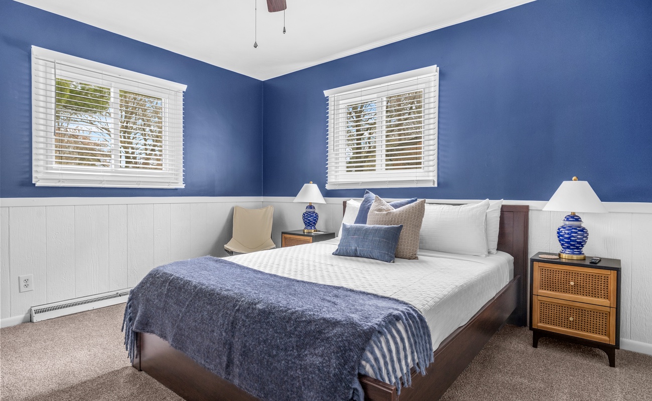 Bedroom 2 is on the main level & has a queen-size bed.