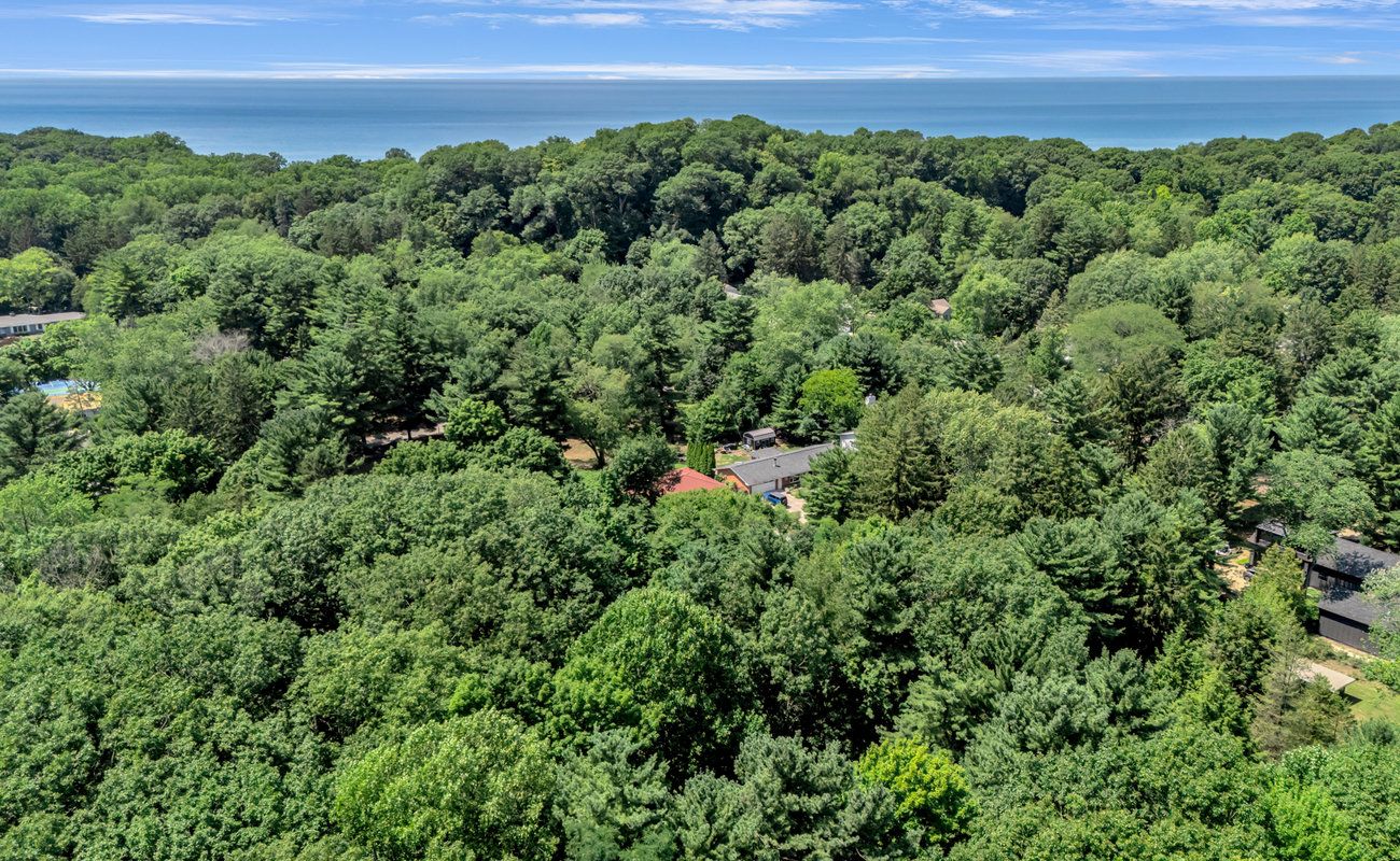 A tucked in the trees, just minutes from Lake Michigan.