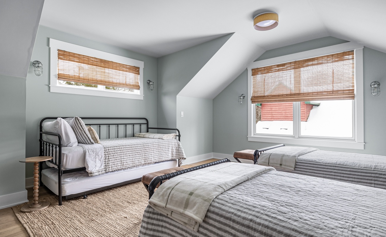Bedroom 4 is on the upper level & has 2 twin-size beds and 2 daybeds with trundles.