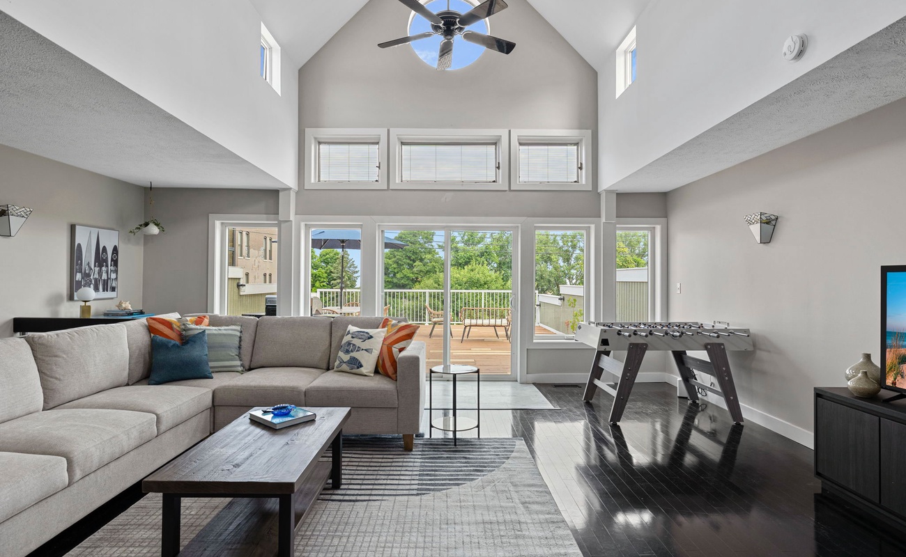 With ample seating, stunning views, and a foosball table for fun, it's the perfect spot to unwind and entertain. Who's ready to lounge in style?