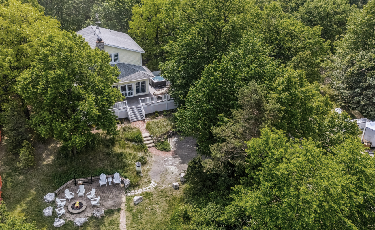 Your private paradise—deck, hot tub, and firepit included.