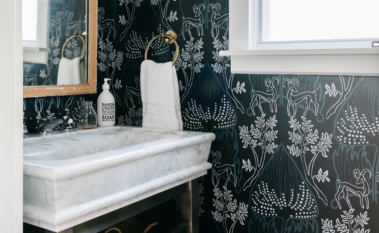 A separate water closet is part of the main bedroom.