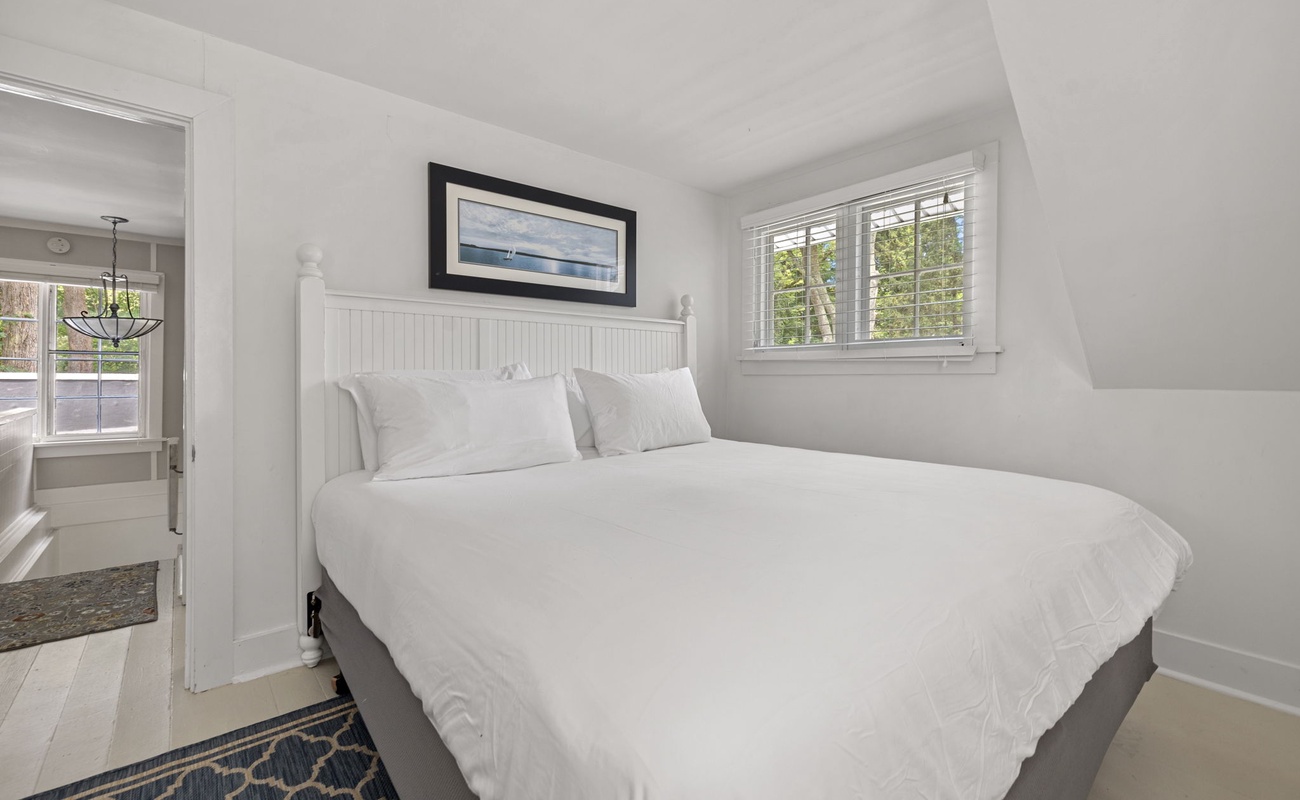 Bedroom 3 is on the upper level & has a king-size bed.