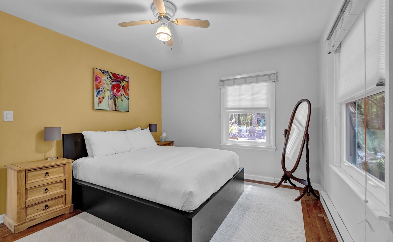 Bedroom 2 is on the main level & has a queen-sized bed.